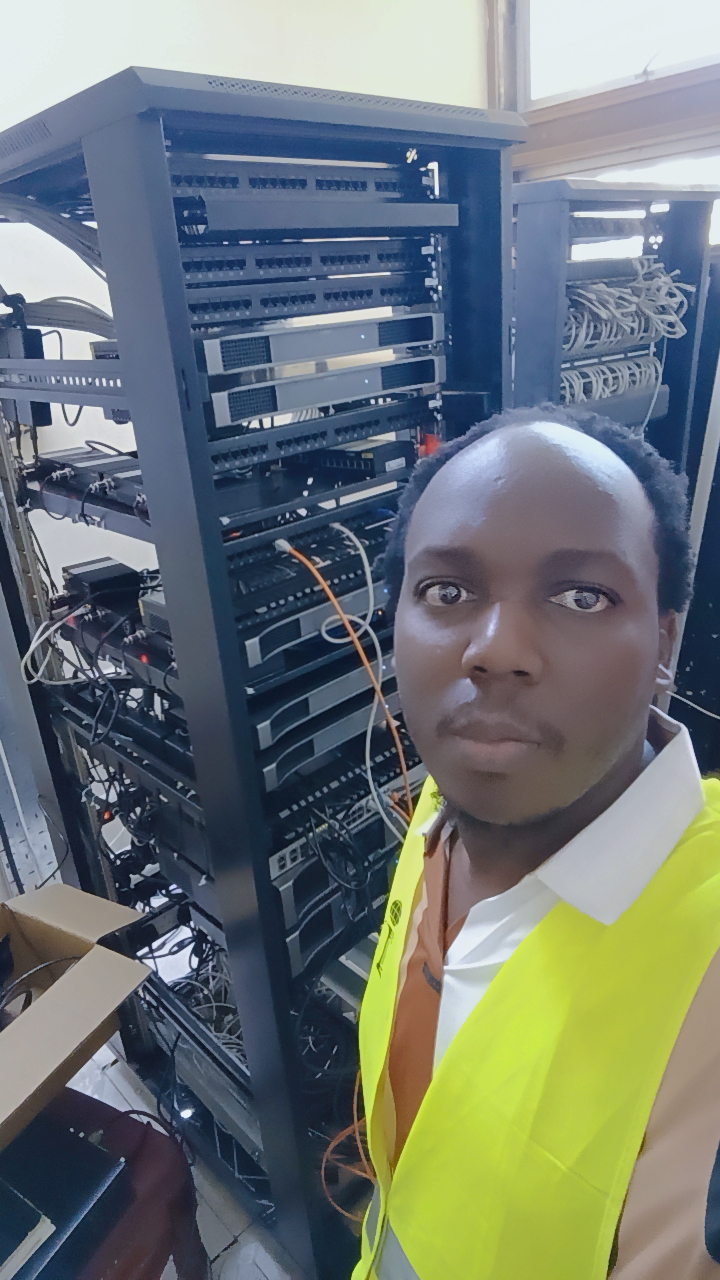 Bedrock Systems engineer at the server and network racks supporting the conference system